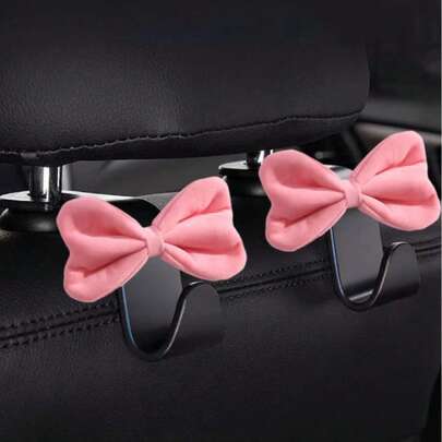 1 pièce/2 pièces/4 pièces Crochet de siège de voiture en forme de nœud rose rouge pour femme, fille. Organisateur de rangement multifonctionnel universel pour le dossier de siège. Accessoires automobiles
