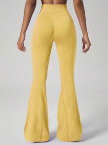 Pantalones acampanados elásticos para mujer, con cintura elástica acanalada, que levantan el trasero, con diseño en forma de corazón, ajuste estilizante