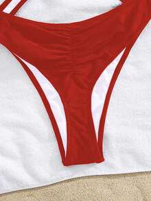 Traje de baño de una pieza con escote halter y espalda cruzada sexy, estilo europeo moderno para mujeres