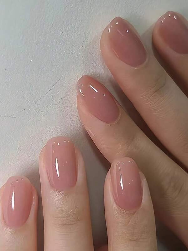 24pcs Short Sweet Minimalist Solid Shiny Pink Acrylic Full Cover Fake Nails, Reusable Nail Tips Suitable For Girls & Women. Includes 1pc Jelly Gel And 1pc Nail Buffer, Easy To Apply After Cleaning Nails, Press On Nails With Jelly Gel For 15 Seconds For Beautiful New Nails. Recommend Using With Nail Gel For More Durable Wear.