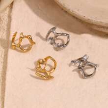1 paire de boucles d'oreilles asymétriques à la mode et ajourées
