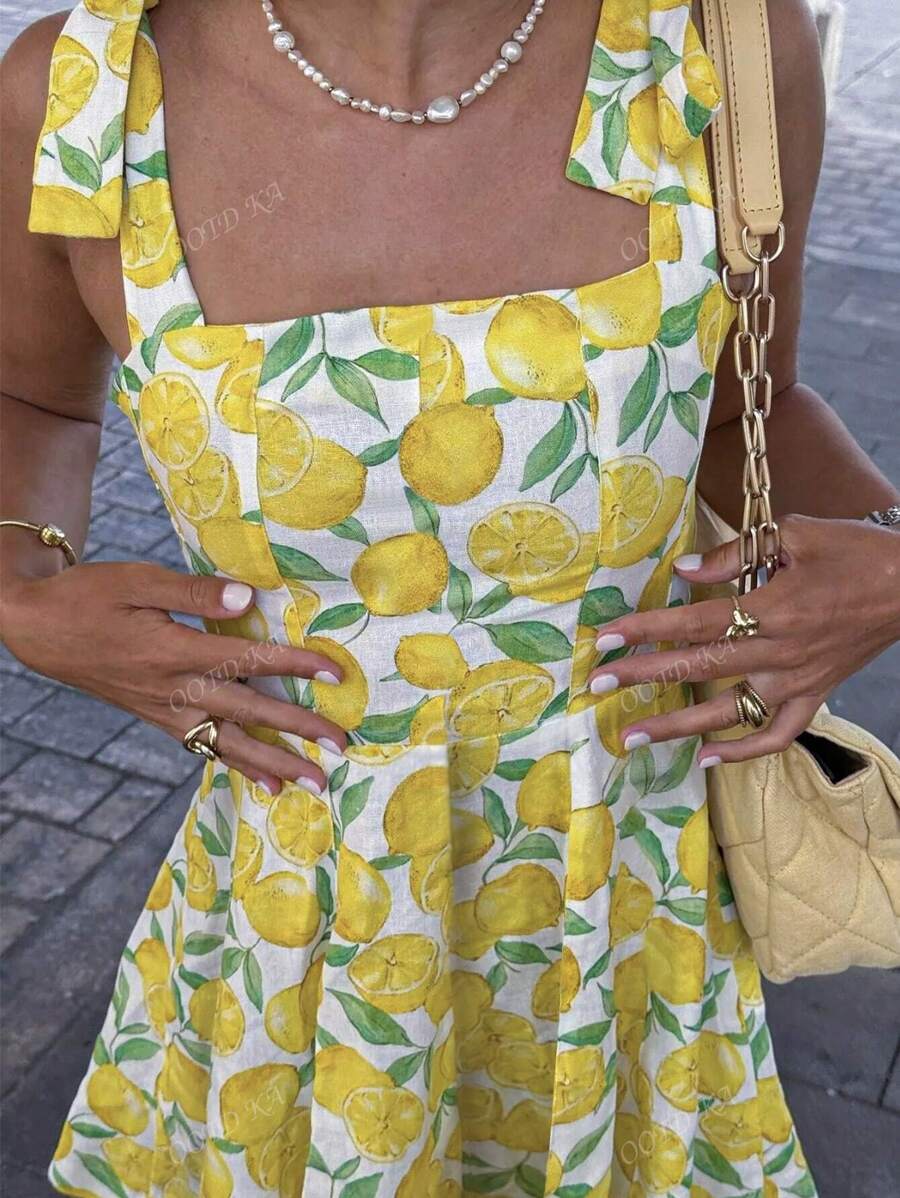 Vestidos de moda elegantes y casuales de estilo resort para mujer en primavera y verano con diseño de estampado de limón, sin tirantes, con nudo, sin mangas, escote halter y línea A, en mini longitud