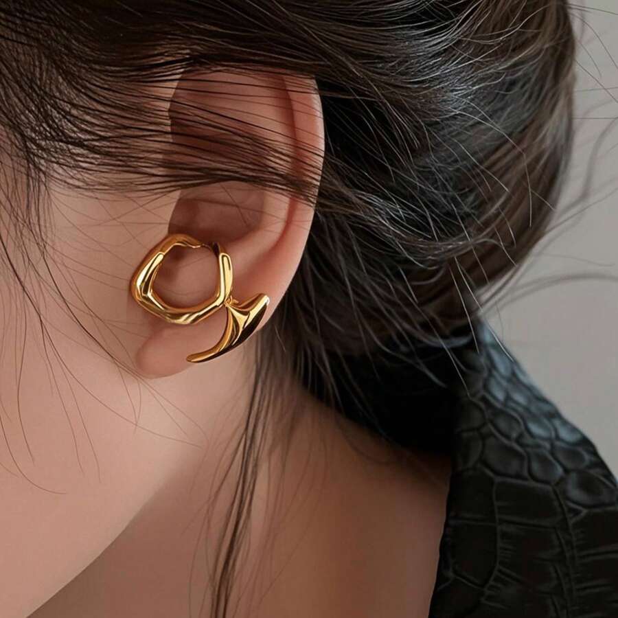 1 paire de boucles d'oreilles asymétriques à la mode et ajourées