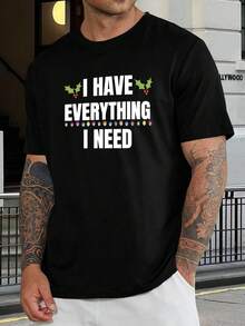 Camiseta gráfica con motivos de luces navideñas y acebo - Camiseta festiva de Navidad para hombres, mujeres y adolescentes - Regalo perfecto de Navidad, camiseta informal de cuello redondo y manga corta - Negro - Ver 1