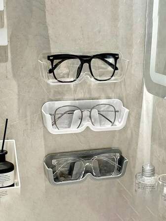 1个塑料壁挂式眼镜收纳盒，无需钻孔即可安装，多功能眼镜收纳架，可展示高端太阳镜和光学镜架，节省空间，适用于家居、梳妆台、台面和零售展示，简约现代塑料设计，防尘保护盒，无需工具即可轻松安装，适合日常使用、旅行准备、送礼、秋季家居焕新、万圣节派对装饰、感恩节聚会、圣诞节壁炉架装饰等场合。