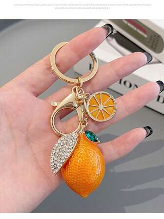 1 pieza Llavero creativo y lindo con forma de naranja con brillantes, colgante de fruta colorido en forma de rebanada de naranja de metal como regalo del Día de la Madre para mamá y amigos