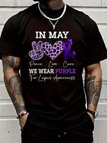 Camisa 100% de algodón negra con el mensaje "En mayo usamos púrpura" y el lazo de concientización sobre el lupus en color púrpura - Camiseta de lupus para hombres - Negro - Ver 1