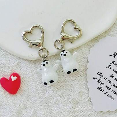 Llavero 3D de pingüinos enamorados - 1 par de colgantes de resina con pareja adorable de pingüinos, adecuado para bolsos y accesorios de auriculares, llavero de mujer con anillo y tarjeta con corazón, regalo ideal para el Día de San Valentín, llavero de pingüinos con abrazo cálido y amor, regalo para mejores amigos, esposa, esposo, novio, novia