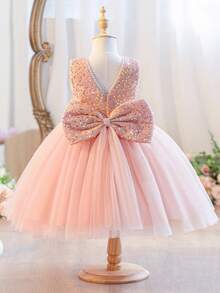 Váy đính sequin hồng cao cấp cho bé gái, trang trí nơ lớn, phù hợp cho tiệc sinh nhật, dẫn chương trình, biểu diễn sân khấu, thi đọc thơ và các dịp quan trọng khác. Mặc lên vừa nổi bật vừa thanh lịch. - Hồng - Xem 1