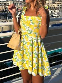 Vestidos de moda elegantes y casuales de estilo resort para mujer en primavera y verano con diseño de estampado de limón, sin tirantes, con nudo, sin mangas, escote halter y línea A, en mini longitud