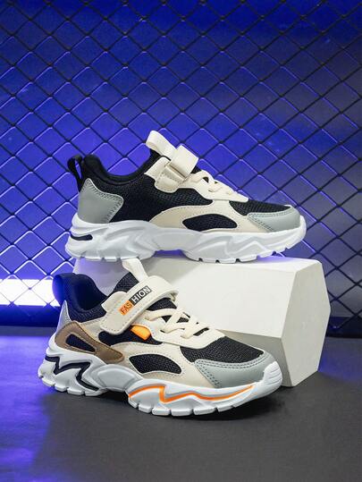 儿童春秋款网眼面料撞色运动鞋，防滑鞋底设计，保护脚趾，可调节钩环闭合，适合日常穿着和上学