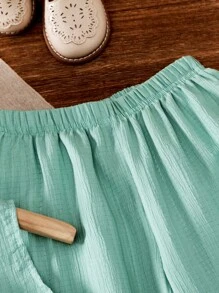 Conjunto elegante de verano para niñas con top de tirantes con volantes y pantalones palazzo de pierna ancha