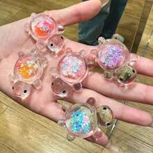 10 pièces Pendentif de tortue de mer lumineux et pailleté, breloques à thème anime sous emballage opaque en acrylique, convient pour créations de bijoux, colliers, boucles d'oreilles, porte-clés, décoration intérieure et extérieure, sans alimentation électrique, idéal pour Noël, Pâques, Thanksgiving, décoration de tortue de mer