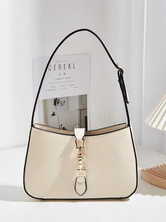 Una elegante y versátil bolsa de baguette ligera de alta gama con correa de hombro ajustable y cierre con hebilla elegante, adecuada para salidas, citas, fotografía, transporte, trabajo, vacaciones y uso diario