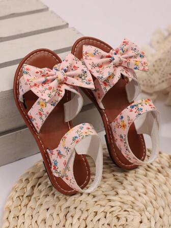 1 par plusstorlek 2025 nya mode mångsidiga rosa flickpärlor och strass rosettknut söta platta sandaler, rund tå, lämpliga för dagligt bruk, dans, utomhusbruk på vår och höst, glitterdekor stängda tå prinsessskor