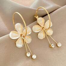 1 par de brincos pendentes longos minimalistas com decoração de strass e design floral circular