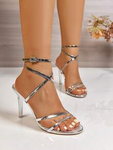 Sandalias de mujer con correas cruzadas y hebilla sexy, nuevas para el verano 2025. Zapatos de tacón alto con punta abierta y diseño envolvente en forma de serpiente