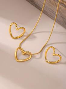 1 paquet Pendentif courbé en forme de cœur creux doré ou argenté à la mode en acier inoxydable. Cadeau de bijoux pour femmes avec chaîne en forme d'os de serpent. Saint-Valentin