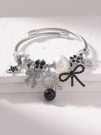 1 pezzo Braccialetto elegante in acciaio inossidabile con cristalli e perle finte a forma di fiocco per gatto, adatto per le donne per partecipare a feste, può essere regalato per San Valentino, Festa della Mamma