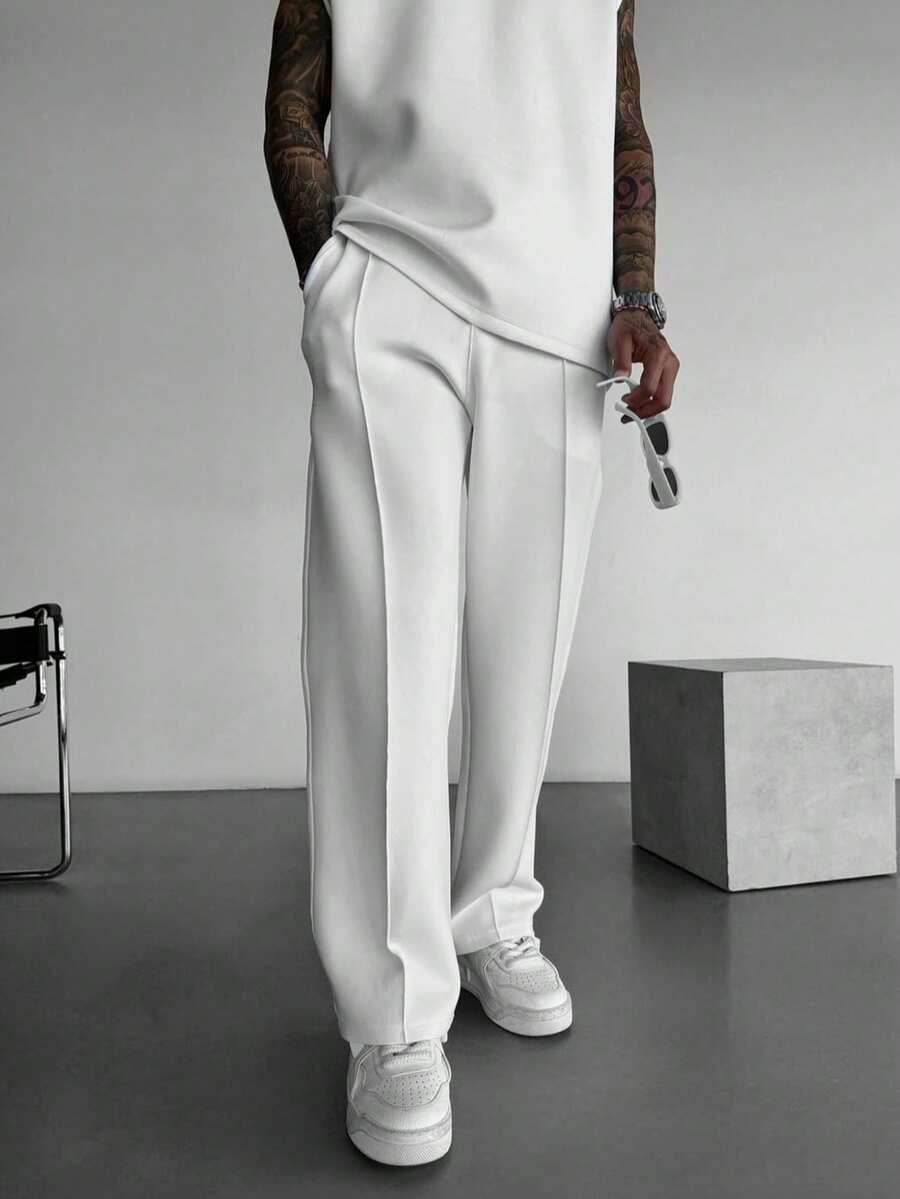 男士宽松直筒针织裤，轻薄透气，纯色设计，休闲百搭，适合春、秋、初冬穿着。