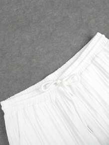 Conjunto de camisa de manga corta de un solo pecho y pantalones de unicolor para hombre de talla grande