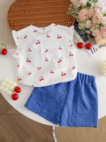 Conjunto de 2 piezas de top informal con estampado de cerezas y lazo, talla grande shorts azul denim para niñas