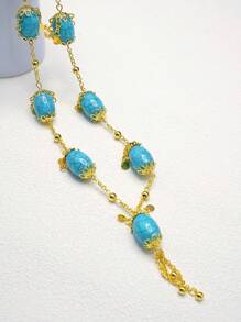 Collana lunga alla moda ed elegante in turchese, molto popolare nel Medio Oriente, semplice e realizzata con perline di turchese