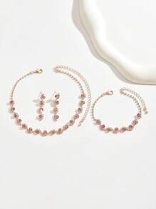 1 Set de joyas de 3 piezas con collar, pulsera y aretes con cristal azul de strass con diseño ondulado