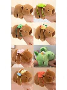 可爱的水豚毛绒玩具，配有拍手环，创意设计，可佩戴在手腕上，是送给朋友的独特圣诞节和新年礼物。关键词：水豚，玩偶，圣诞节，水豚服装，趣味毛绒玩具 - 彩色 - 查看 1