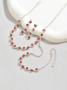 1 Set de joyas de 3 piezas con collar, pulsera y aretes con cristal azul de strass con diseño ondulado