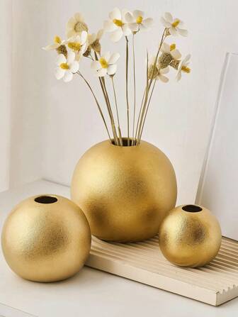Een eenvoudige en stijlvolle, effen gekleurde bolvormige vaas. In Scandinavische stijl, met een glad oppervlak en een ronde vorm. Geschikt voor gedroogde of verse bloemen en geschikt als dagelijkse decoratie in woonkamers en slaapkamers. Ook geschikt als decoratie voor thuis, geschikt voor dagelijks gebruik en feestjes. Door het minimalisme is deze vaas ideaal voor romantische feesten zoals Valentijnsdag en als dagelijkse decoratie in huis.