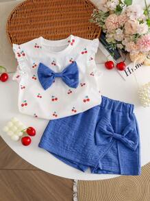 Conjunto de 2 piezas de top informal con estampado de cerezas y lazo, talla grande shorts azul denim para niñas
