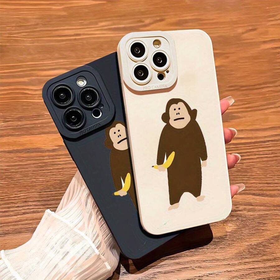 Funda para teléfono con un mono comiendo un plátano, diseñada con impresión y estética visual. Este teléfono mate ofrece modelos de 360 grados 11, 12, 13, 14 Pro, 15, XR, XXS, 8 Plus, SE y. Es un cumpleaños para niños y niñas. - Negro - Ver 1