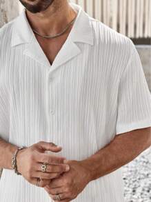 Conjunto de camisa de manga corta de un solo pecho y pantalones de unicolor para hombre de talla grande