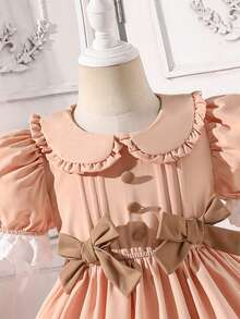 小女孩优雅公主风白色连衣裙，蝴蝶结装饰，蓬松泡泡袖设计，适合生日派对、节日、摄影，适合4-7岁，春夏季 - 杏色 - 查看 4