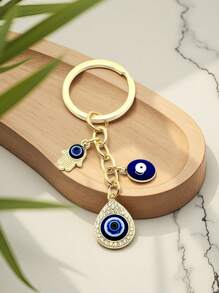 1 pieza Llavero estilo europeo y americano con colgante de mano, gota de agua, ojo del diablo, accesorio adecuado para accesorios de ropa de mujer y hombre, adornos de bolso y accesorios de coche