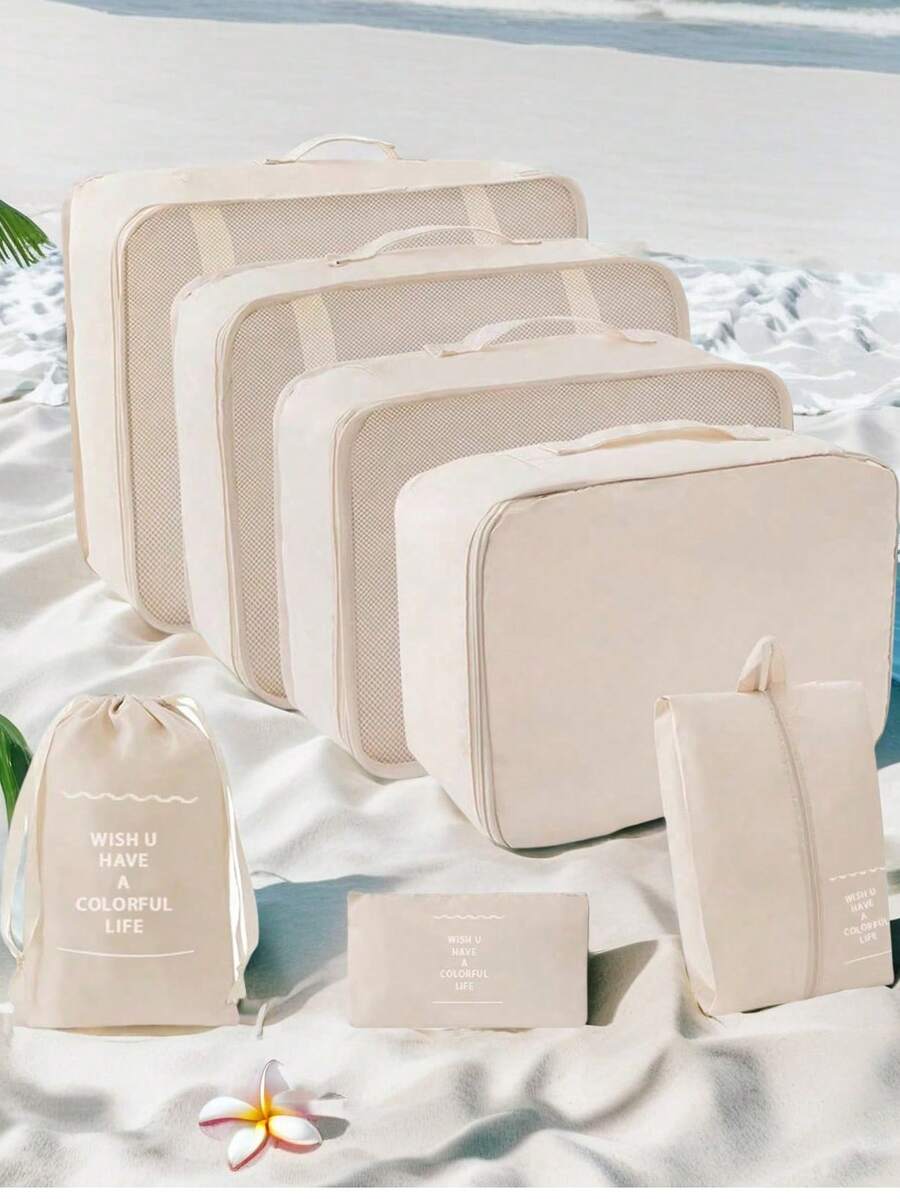 7 pièces Set d'organisateurs de voyage portables, fabriqués en tissu léger et résistant aux plis, incluant des cubes d'emballage pour vêtements, des sacs à chaussures transparents, une pochette pour cosmétiques, un sac de toilette, un sac à linge en maille, un design à compartiments efficace pour les valises et les rangements d'armoire à la maison