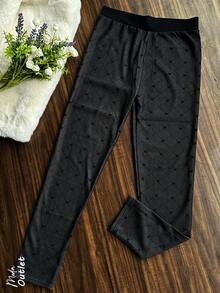 Leggings afelpado para mujer, casual, tela de algodón y poliéster, ideal para actividades al aire libre, apto para temporadas de otoño e invierno, cálidos y cómodos. Te llegará un legging en color negro y estampado al azar. - Negro - Ver 1