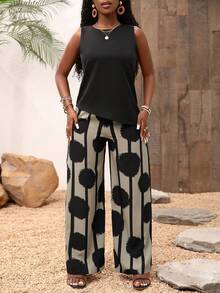 Set de 2 piezas: Top asimétrico sin mangas de unicolor y pantalones largos con estampado floral