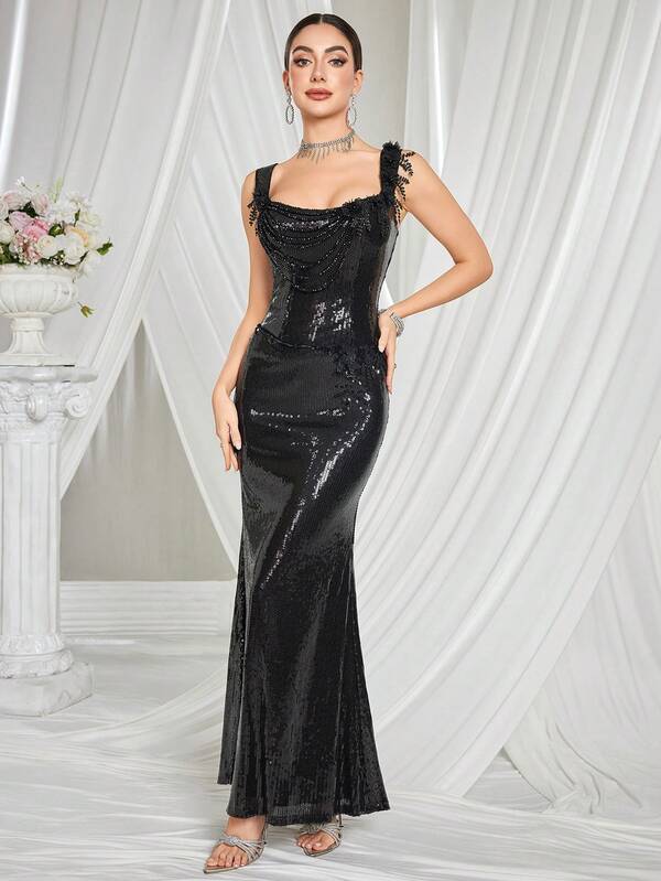 Abito elegante da cocktail con paillettes, chiusura lampo frontale e schiena scoperta