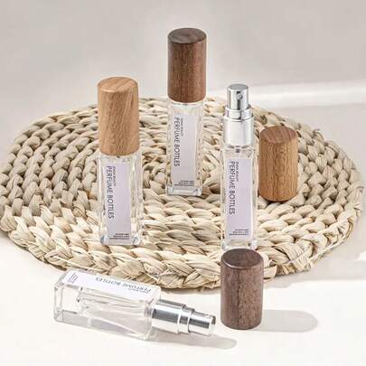 1个，5毫升/10毫升/20毫升/30毫升/50毫升高档木纹盖喷雾玻璃分装瓶，适用于香水分装、样品分装、旅行和随身携带。