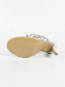 Tacones de aguja de punta abierta con tira de moda plateada, con aplicación de cristal en forma de serpiente, apropiados para verano y otoño, ideales para el Día de San Valentín