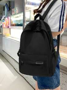 Mochila grande de estilo colegial casual e minimalista com vários bolsos e logotipo em letra, adequada para compras, transporte, passeios, viagens e escola