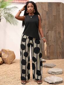 Set de 2 piezas: Top asimétrico sin mangas de unicolor y pantalones largos con estampado floral