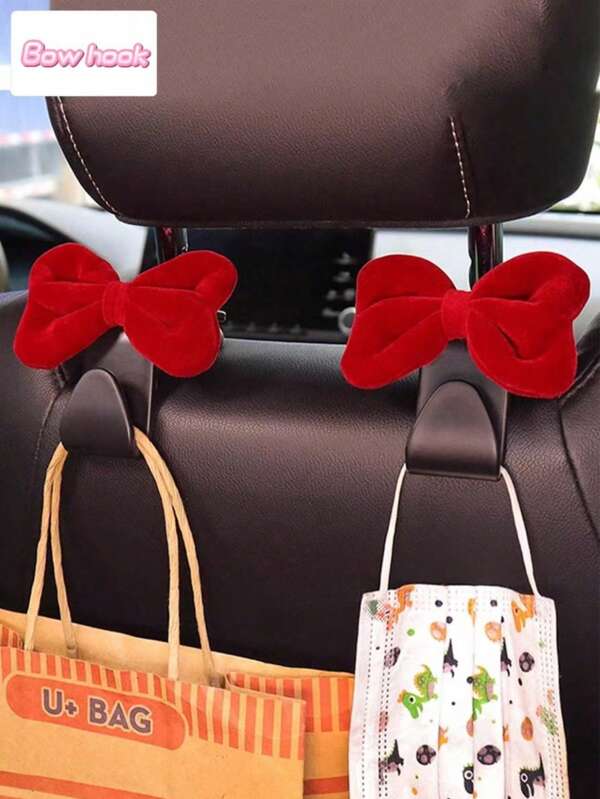 2 pièces Crochet de siège d'auto en forme de nœud rose et rouge pour femmes, filles. Organisateur de rangement multifonctionnel universel pour le dossier de siège. Accessoires automobiles