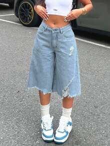 Jeans de denim de 3/4 con bajo asimétrico y efecto desgastado para mujeres - Lavado ligero - Ver 6