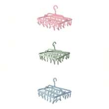 1 pièce Séchoir à linge pliable en plastique PP avec pinces à linge, avec 32 pinces, séchoir à linge suspendu et anti-vent pour les vêtements, sous-vêtements, chaussettes et plus