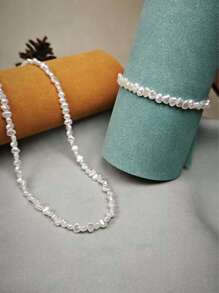 Set di gioielli composto da collana e braccialetto con perle finte irregolari, un regalo