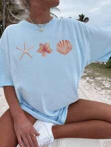 Camiseta de manga corta con cuello redondo de estilo versátil de vacaciones, con estampado de conchas y estrellas de mar, apropiada para el uso diario y de vacaciones. Camiseta blanca estampada para mujer - Celeste - Ver 6