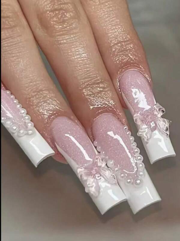 A Set Of 10 Long Water Pipe French Pearl Bow Full Coverage Handmade Wearable Nail Kits, Featuring Unique Craftsmanship That Showcases Bold Fashion. Suitable For Parties, Dancing, And Everyday Wear. Comes With A Manicure Tool Set, Making It An Excellent Gift For Women And Girls.